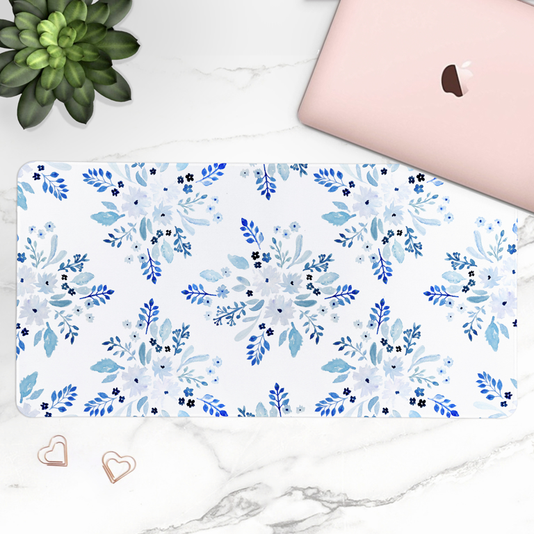 Pretty Floral Desk Mat, with Blue watercolour florals on a white background, the perfect way to decorate your desk while adding comfort to it.