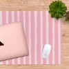 Pink striped desk mat with laptop and mouse on wooden desk