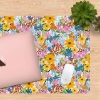 Summer Garden desk mat styled on a wooden desk with laptop and stationery